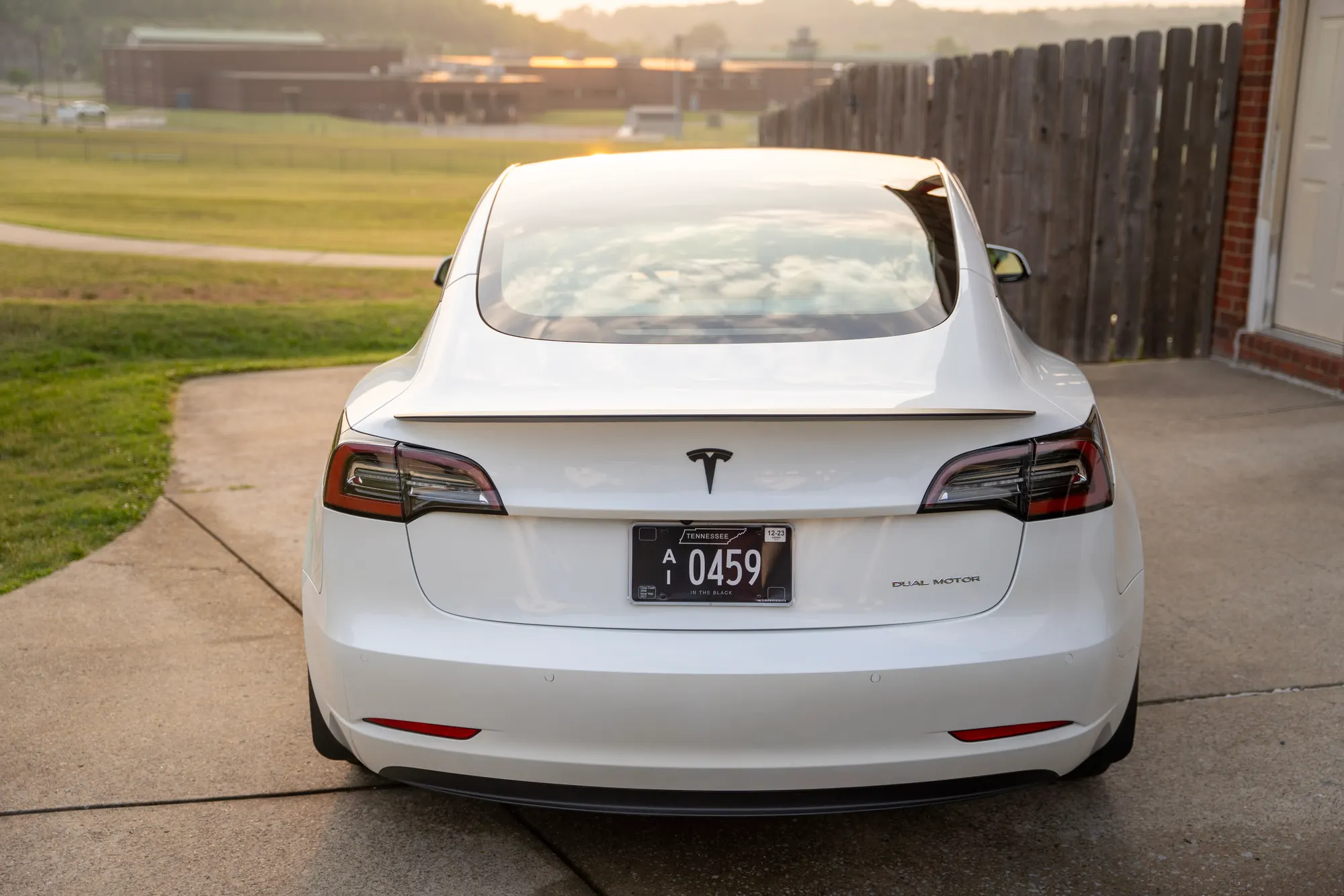 Freshly detailed white Tesla at sunset